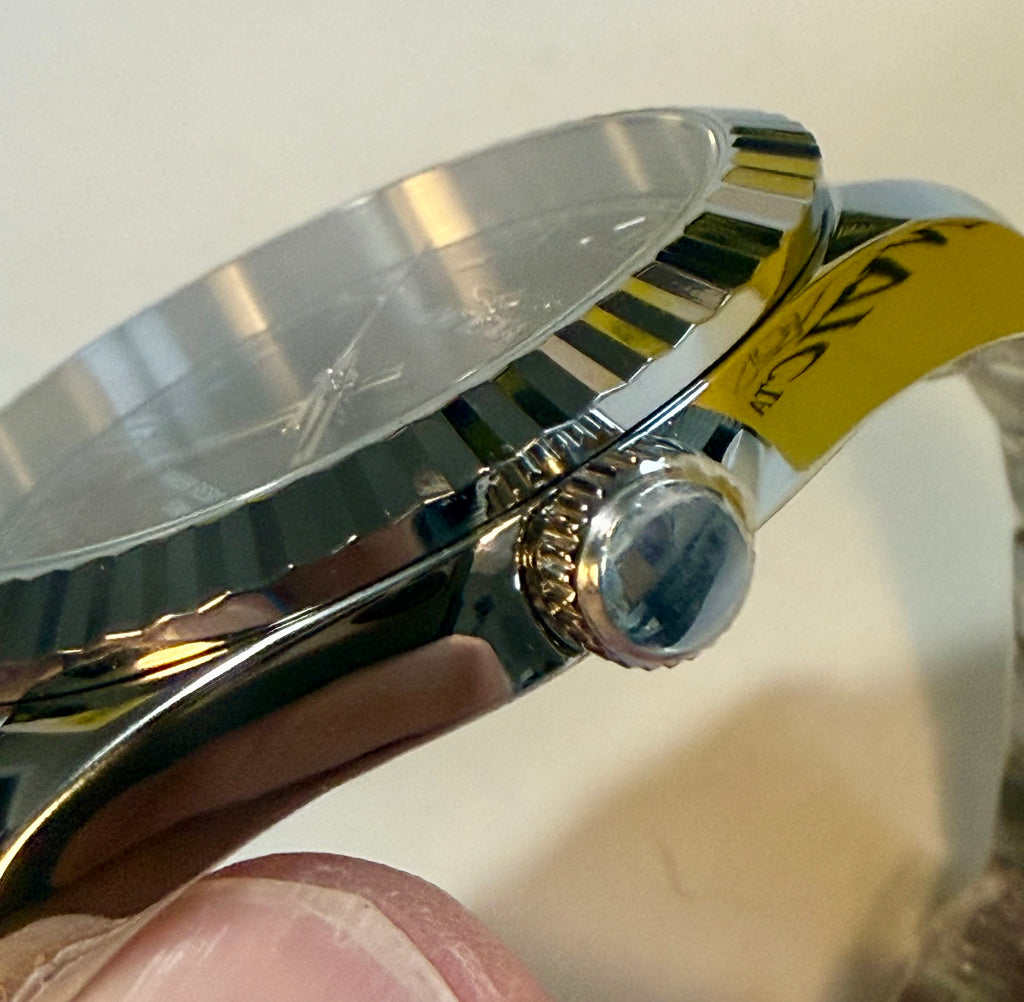 Close-up of a Invicta Specialty Windsor 43mm watch with a brand label on a white background