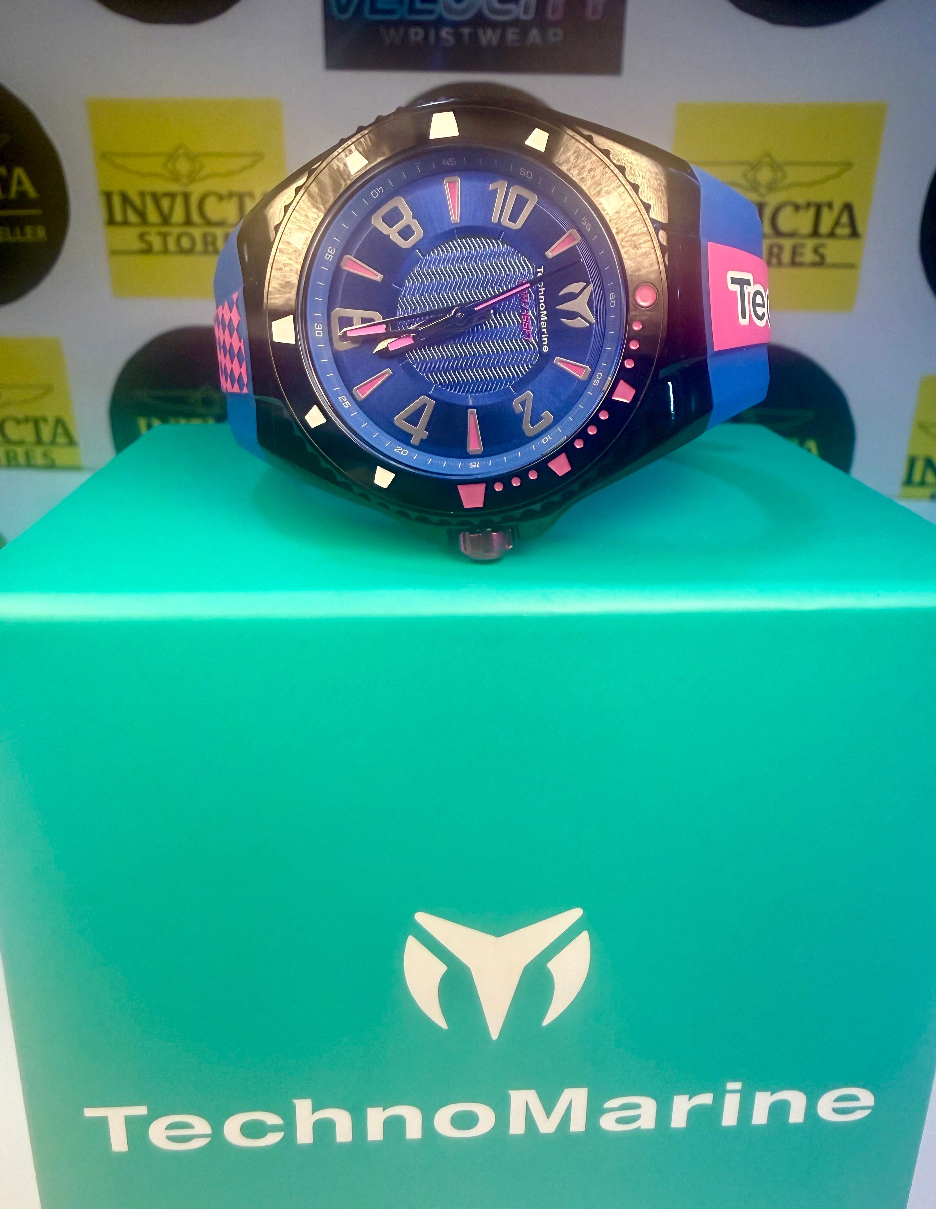 Techno Marine Racing Legends 44mm Wristwatch  watch on a TechnoMarine box with brand logos in the background