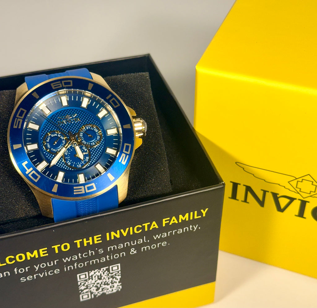 28002 Invicta Mens Pro Diver Impact Blue Dial Gold Tone Silicone 50mm 100m Watch in display