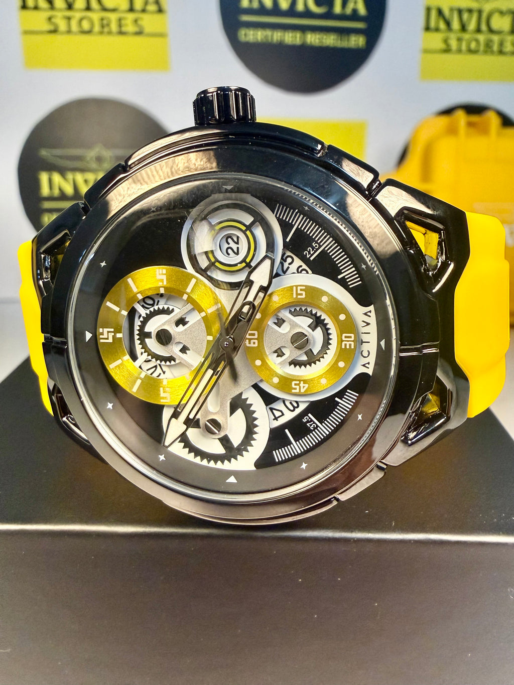 Activa Drift X  watch with yellow and black design on a gray surface