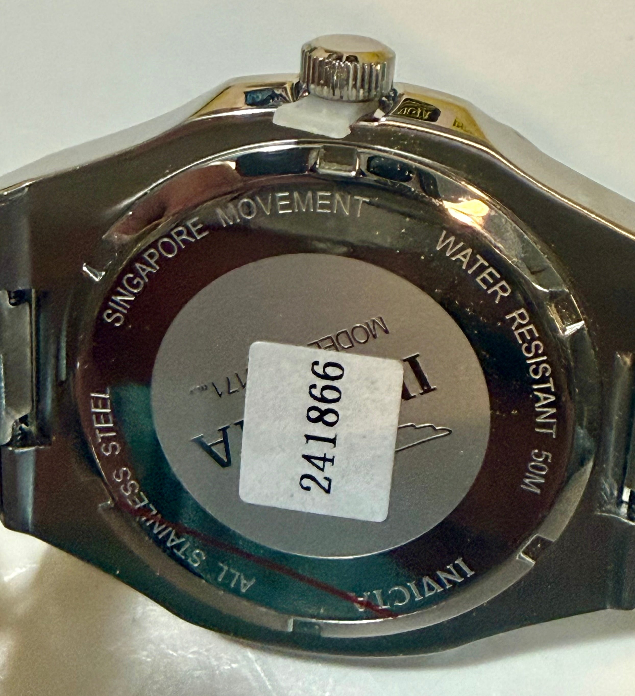 Back view of a Invicta Speedway Vantage Men's Watch - 43mm. Steel on a white background