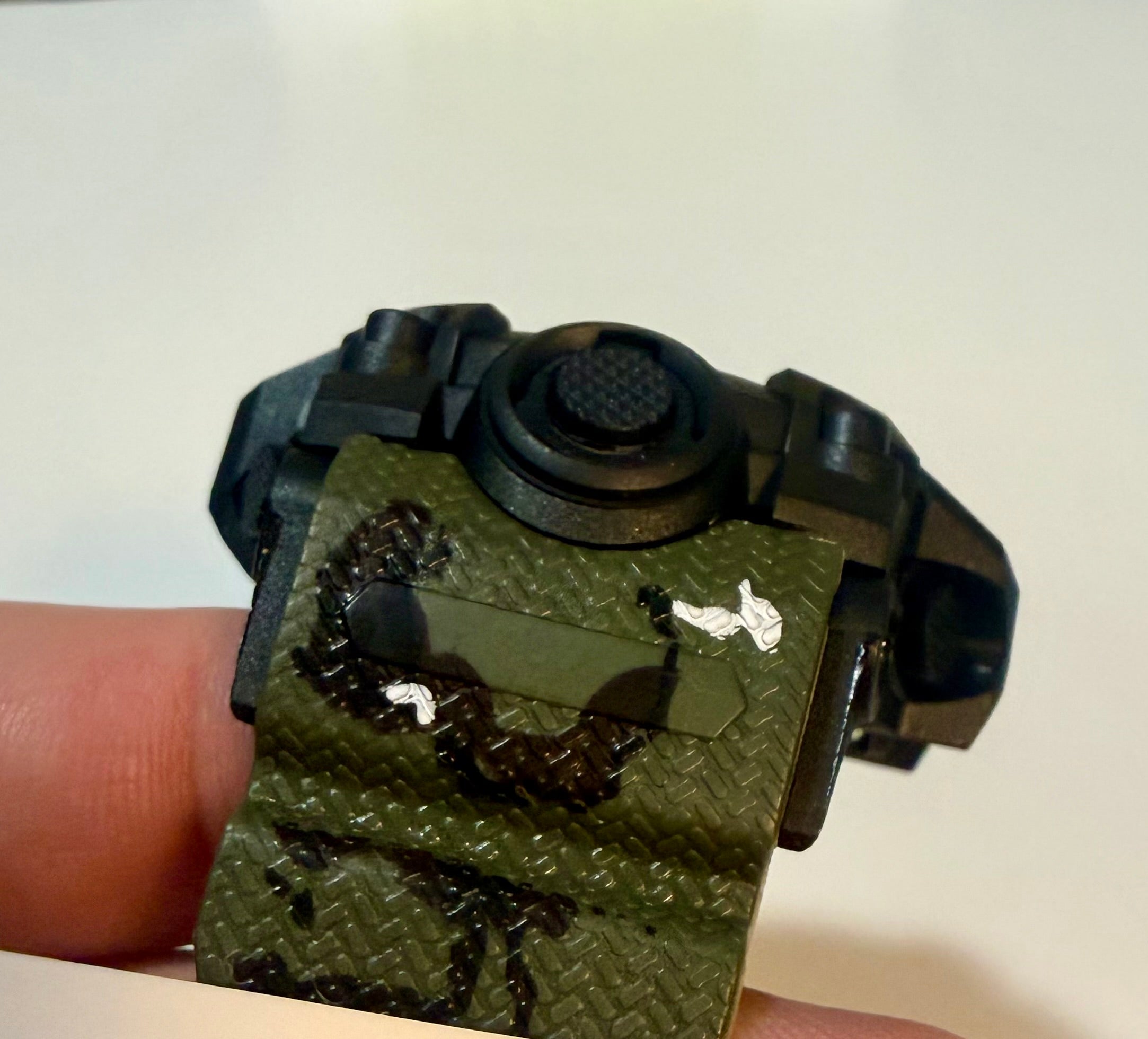 Activa Tactical X Green tactical watch band with black buckle on a white background