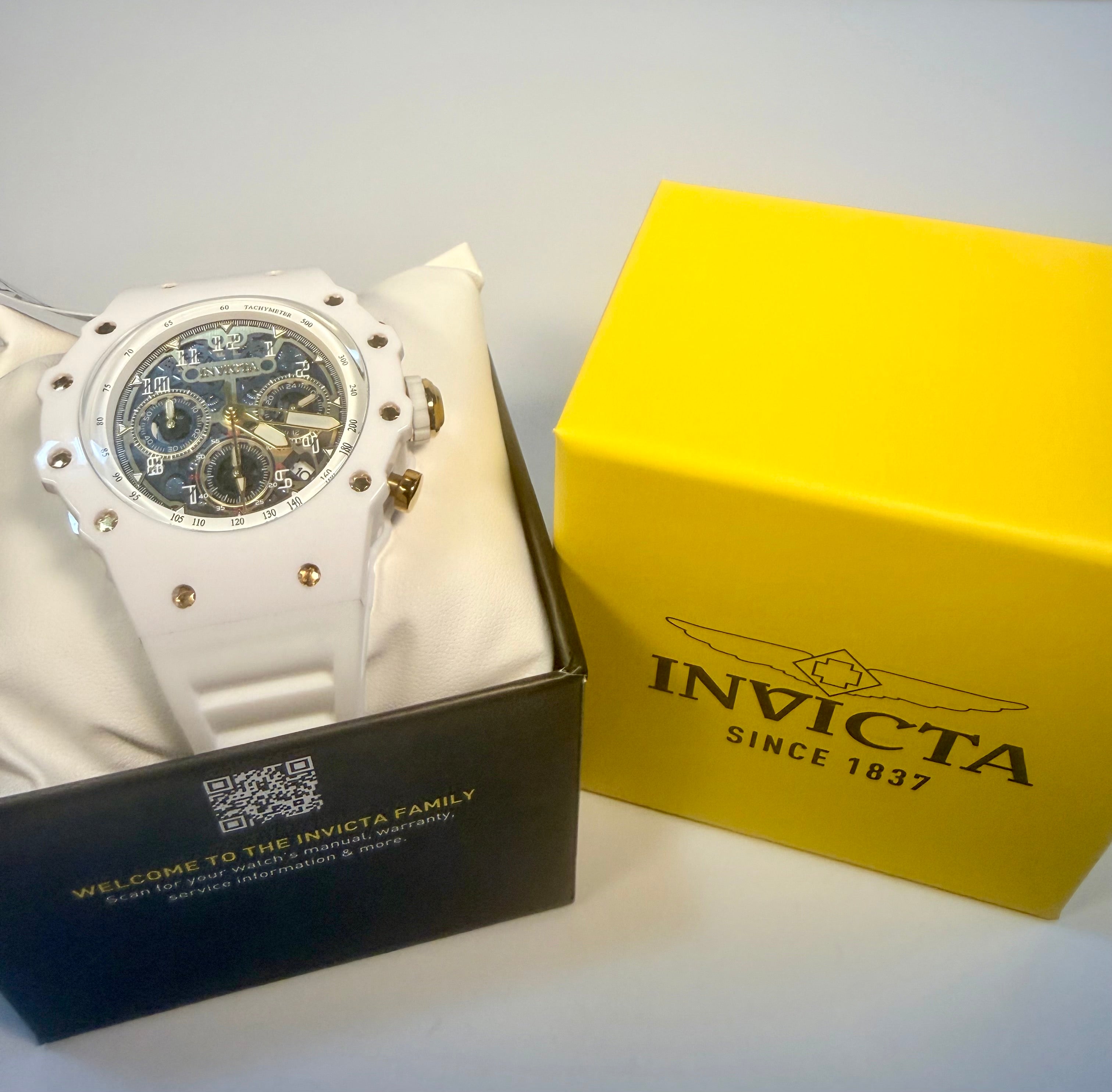 Invicta Men's Racing 43.5mm Quartz Watch IN-69649 Gold Dial White Silicone Strap in display bo