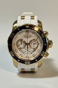 Invicta Pro Diver SCUBA Men's Watch - 48mm. Gold, White Luxury watch with gold and white strap on a white background