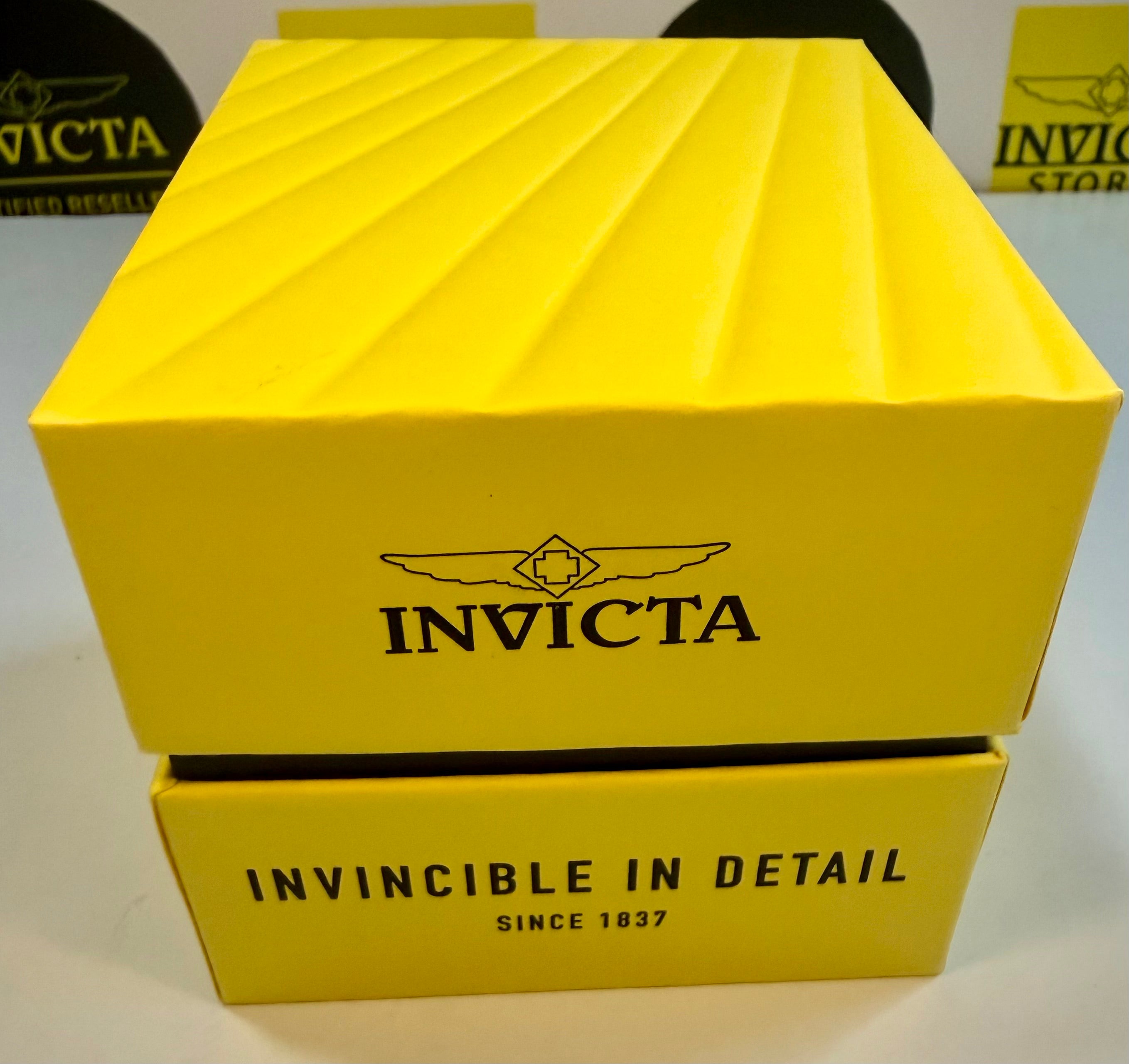 Invicta Mens Automatic Objet' De Art  Yellow Invicta watch box with brand logo and tagline on a white background
