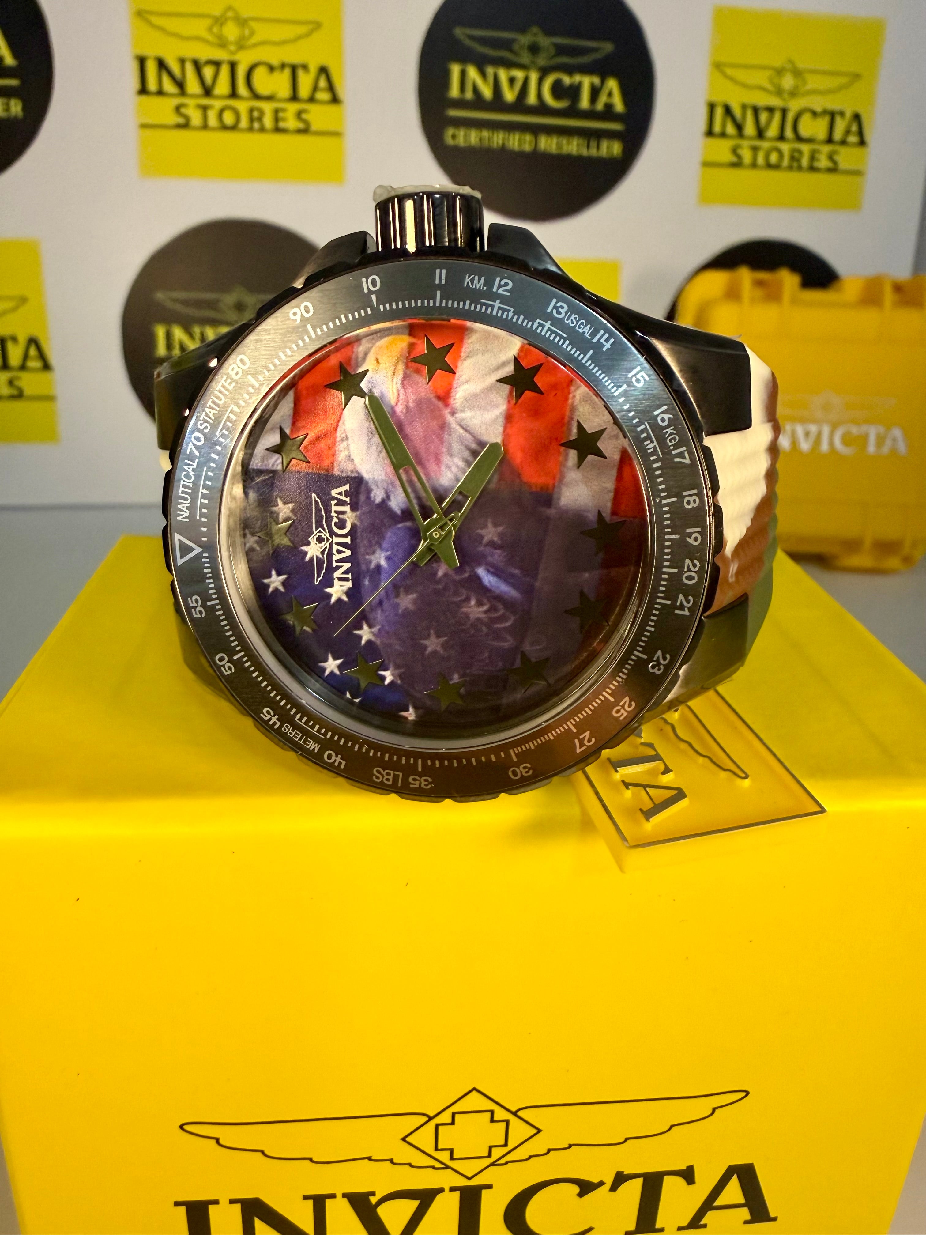 Invicta Aviator Patriotic Camowatch on a yellow stand with Invicta branding in the background
