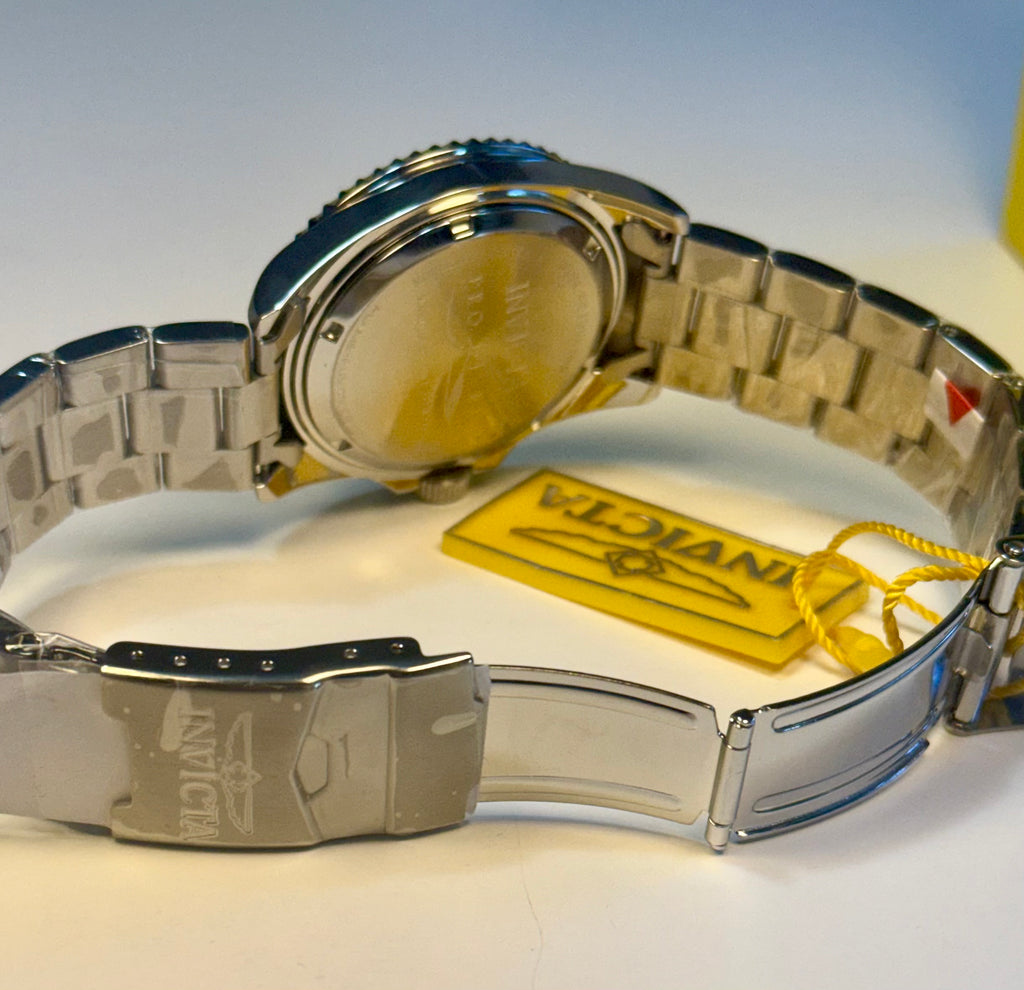 Silver Mens 43mm Pro Diver watch with a visible brand tag on a light background