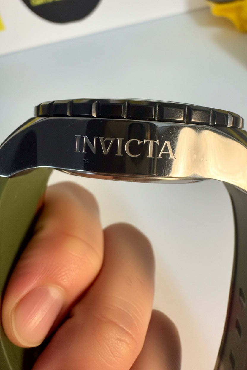Invicta Aviator Patriotic Camowatch band with a hand holding it