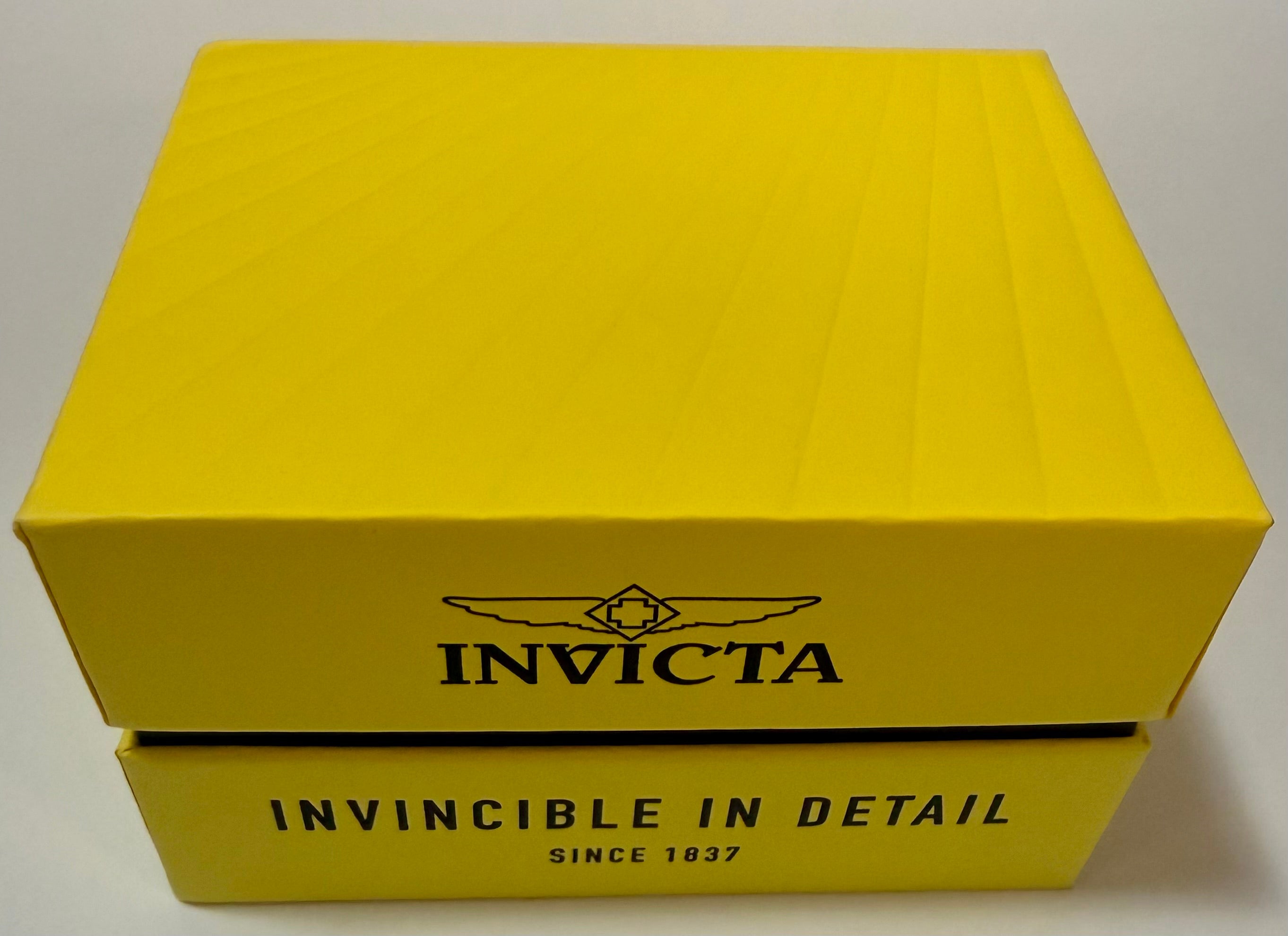 Yellow box with Invicta logo and text on a white background