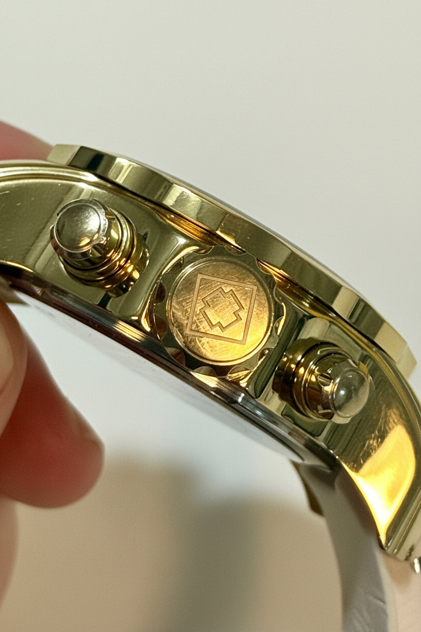 Close-up of a Invicta Pro Diver SCUBA Men's Watch - 48mm. Gold, White on a white background