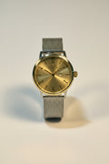 Invicta Mens Specialty Silver watch with a mesh band on a light gray background