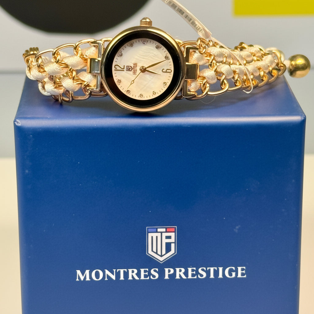 Ladies Montres Prestige Gold wristwatch on a blue 'Montres Prestige' box