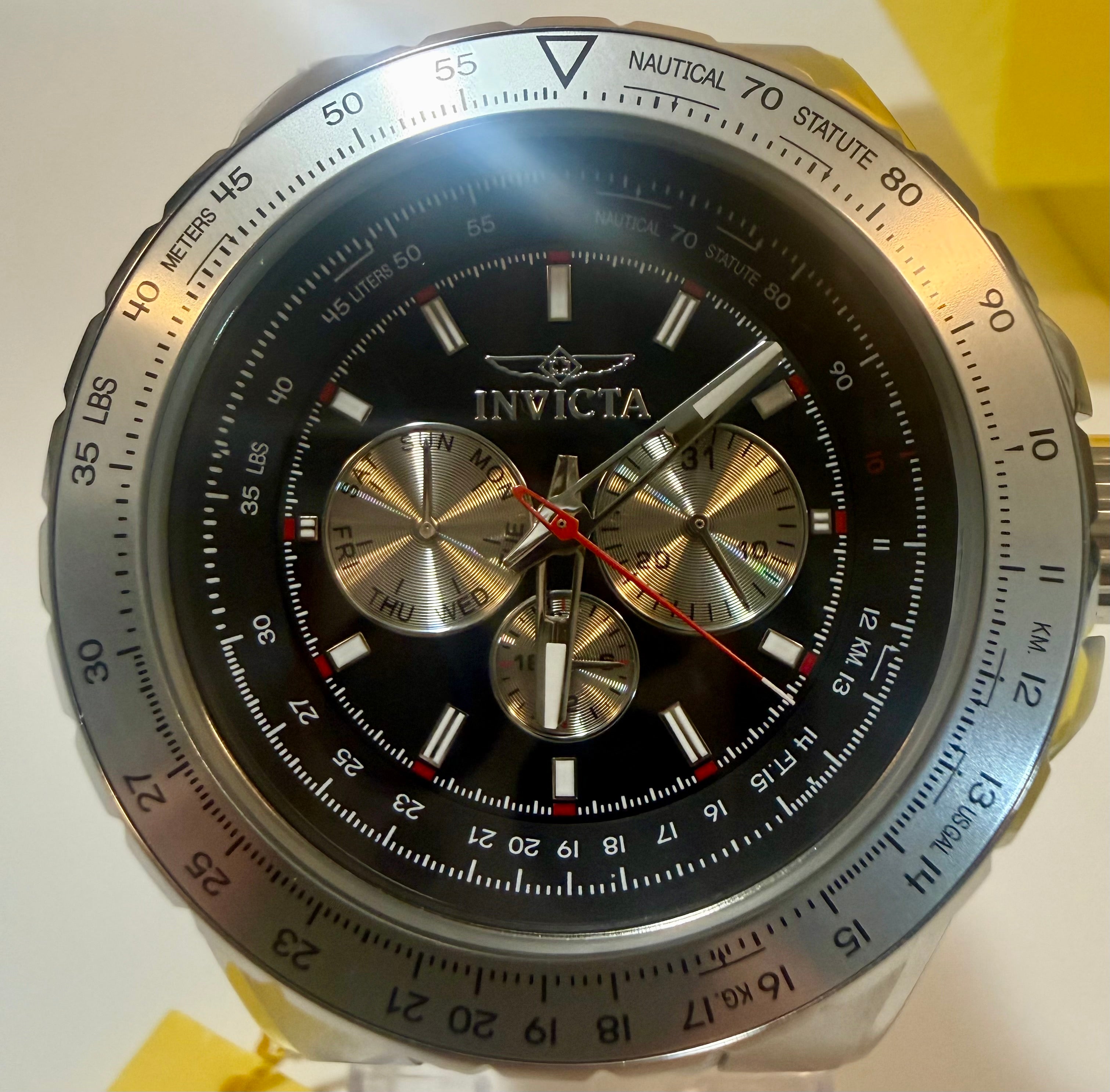 Invicta Aviator  Mens White Silicone Chronograph 50mm with detailed face and brand name on a light background