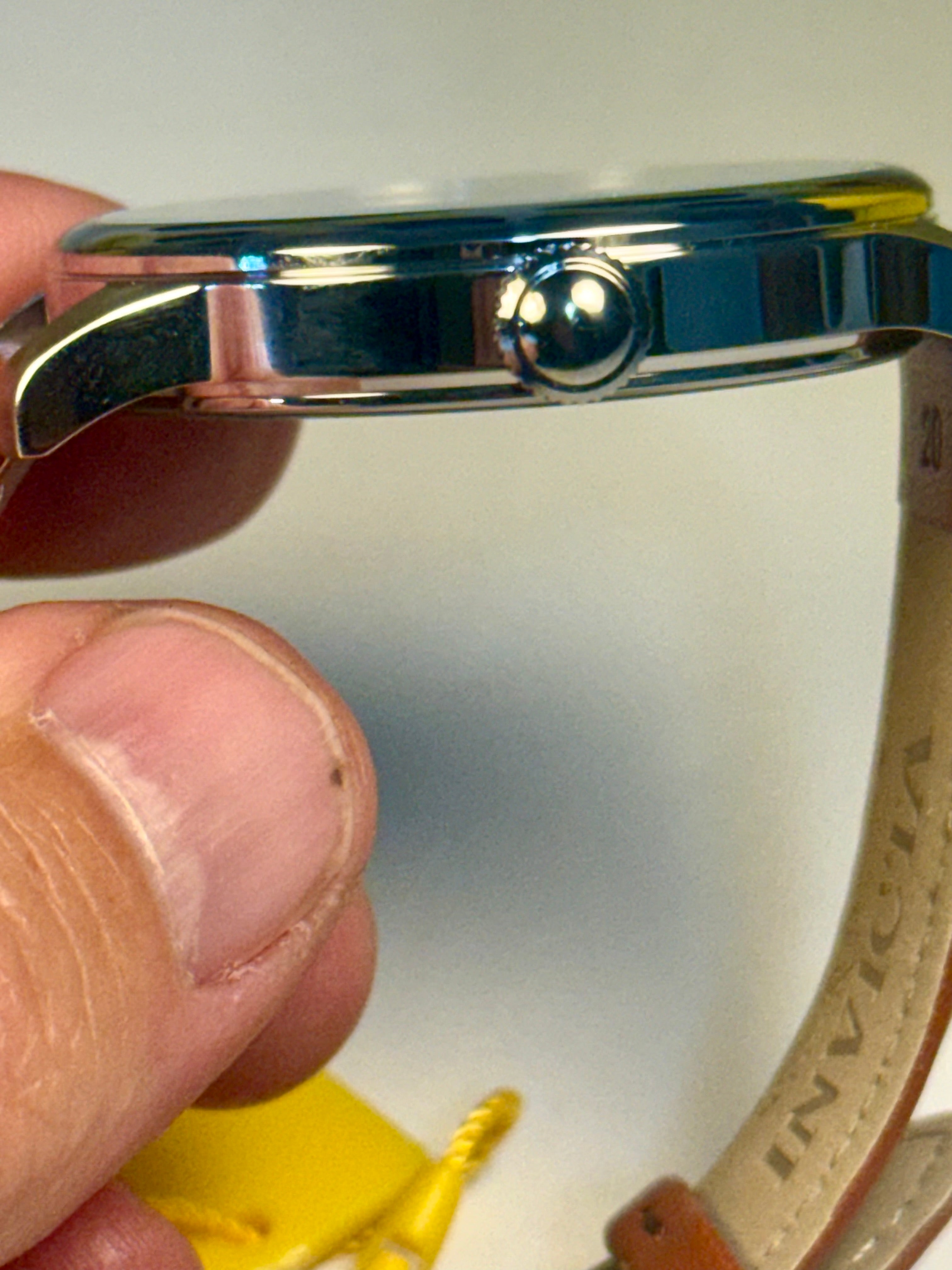 Mens Celestial Blue Sunray Dial Close-up of a watch band with a blurred background