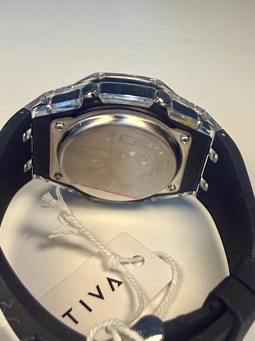Activa Kaleido Rainbow Watch case with 'Tiva' branding on a light gray background